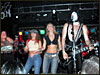 The Kiss Nation "chicks" dancing on stage during the song "Strutter"............sweet!!